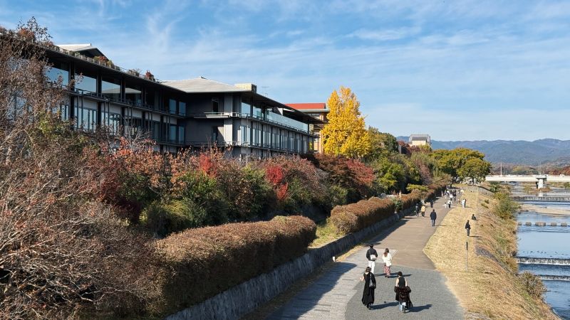 View of the Ritz-Carlton kyoyo and the Kamogawa river in autumn