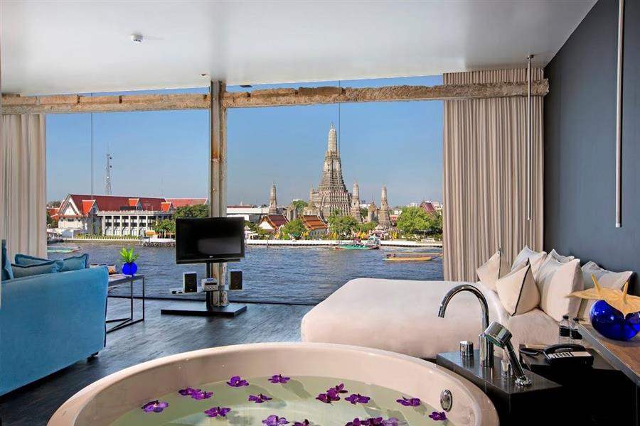 Sala Rottanakosin suite with a glass wall directly across from Wat Arun. Only time I've ever been happy to wake up at dawn just for that view