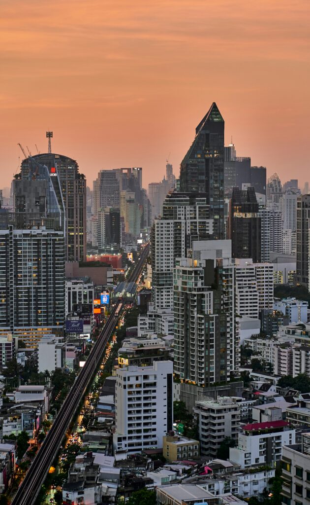 Sukhumvit road and skytrain bridge at sunset, Thong Lor station