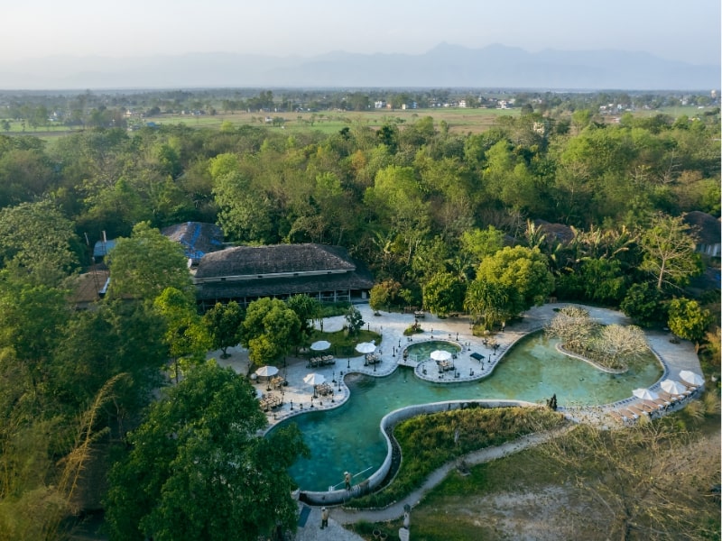Barahi Jungle Lodge, Aerial View With Pool And Mountains