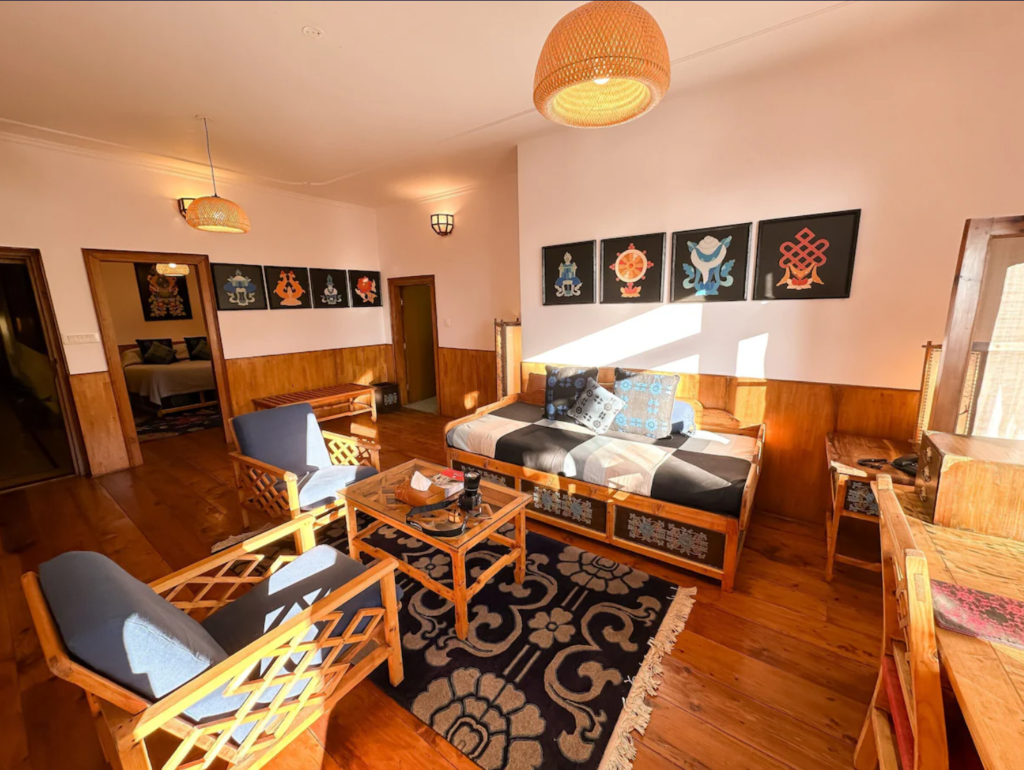 Where To Stay For a Soft Landing In India 43 Chonor House (McLeod Ganj), living room with Tibetan wall art and handcrafted furnishings
