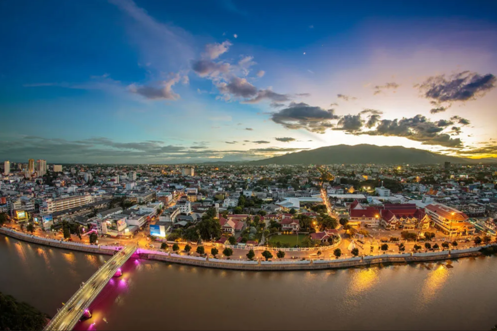 Aerial view of Chiang Mai lit up during sunset