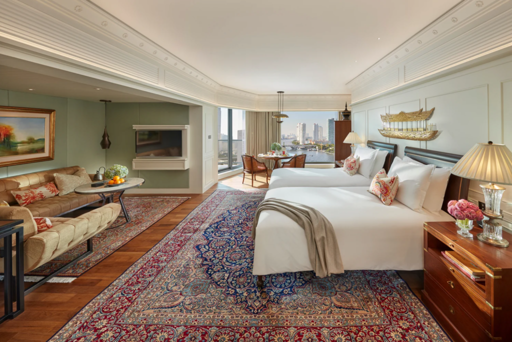 Mandarin Oriental, suite with traditional wall art and large windows with river views