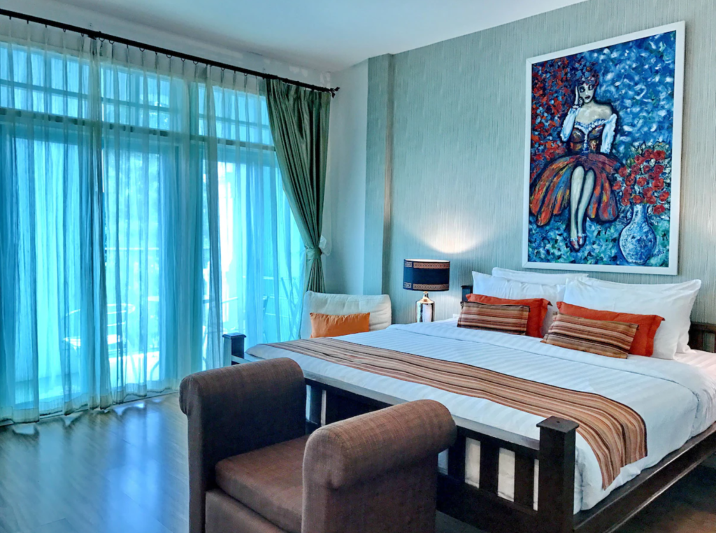 Casa Blanca Boutique Hotel, room with vibrant artwork and natural light