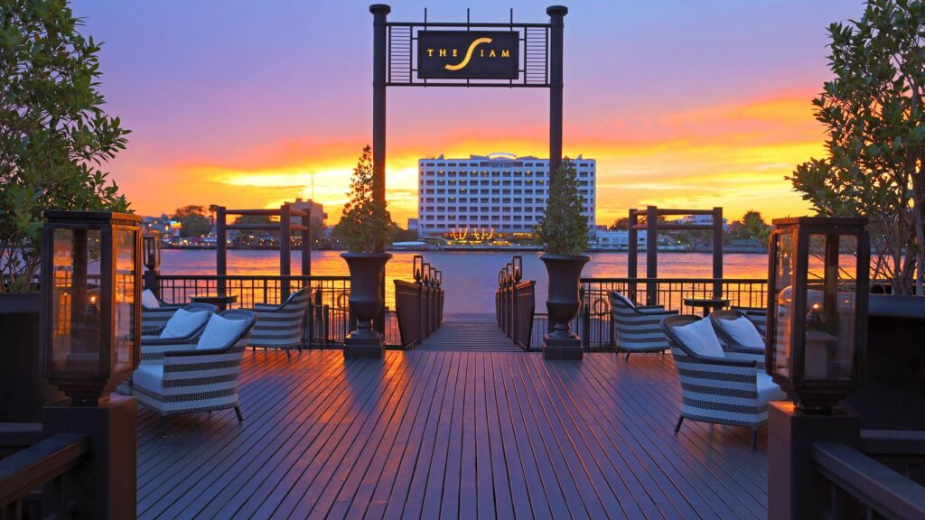 The Siam Dusit pier, view of Chao Phraya at sunset