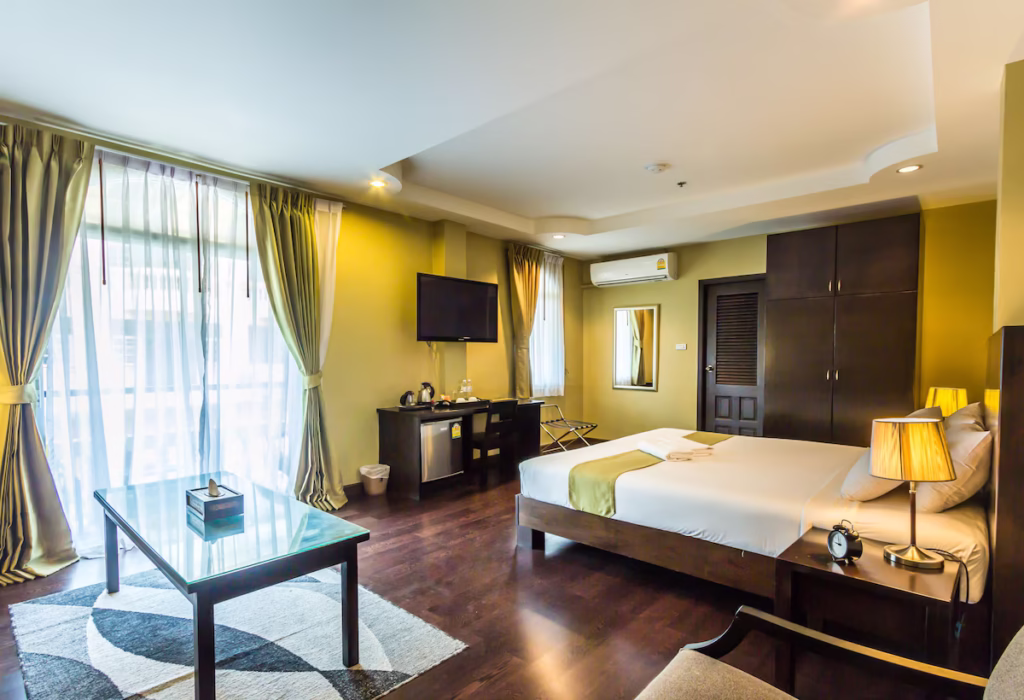 Zing Resort & Spa, room with floor-to-ceiling windows and wood flooring