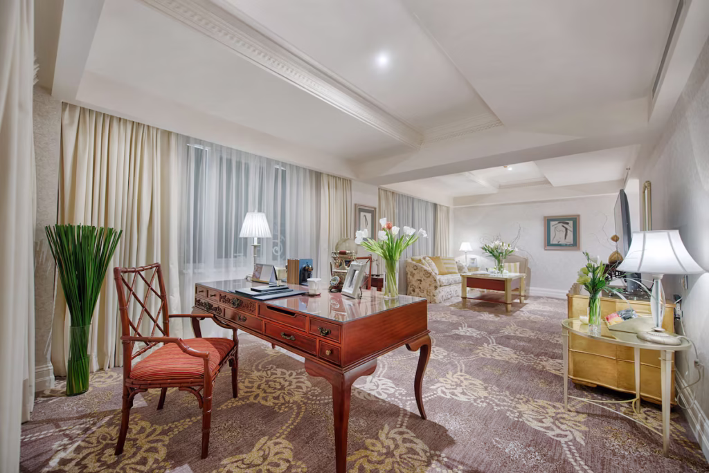 Apricot Hotel, Big Living Room With Working Station, TV, And Comfortable Sofa