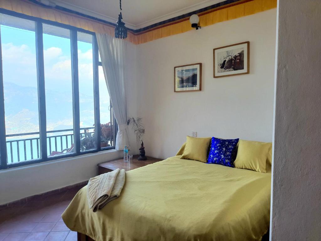 Peace Dragon Lodge, Room With Balcony And Mountains Views