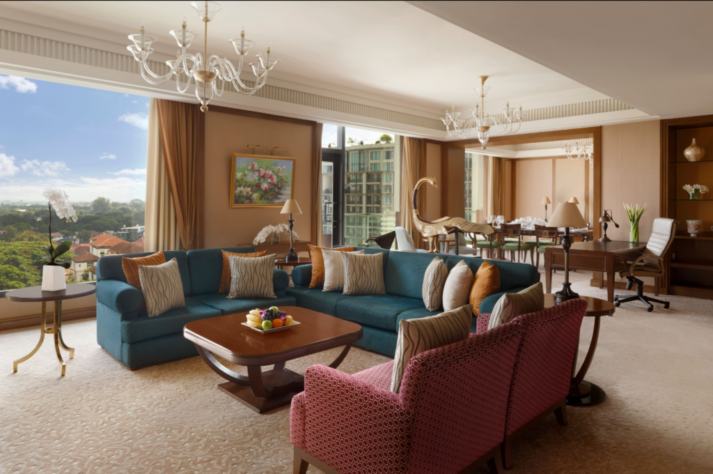 Shangri-La Chiang Mai, room with large living room, floor to ceiling windows, and city views