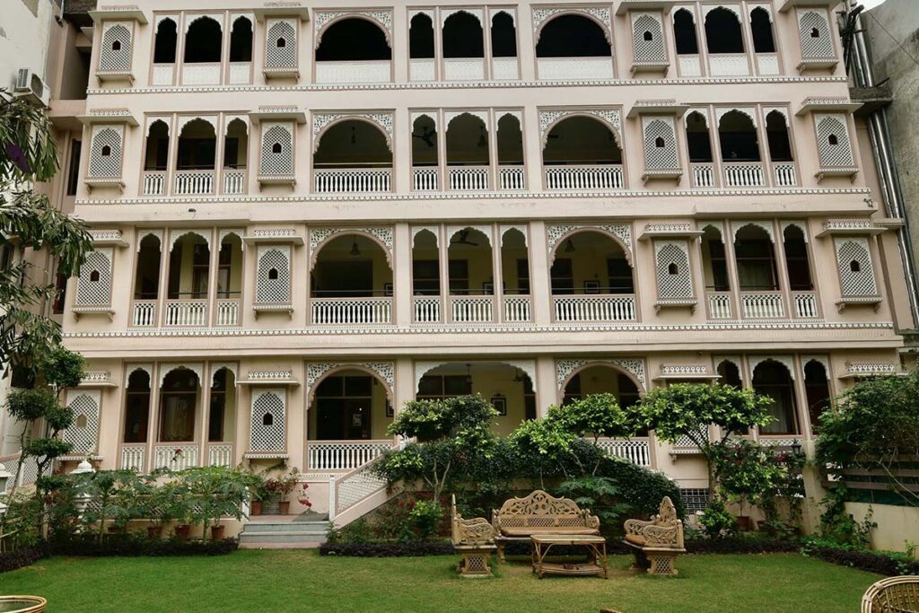 Where to Stay in Jaipur (+ Where Not to Stay): Neighborhoods and Hotels for 2026 16 Arya Niwas hotel, spacious balconies overlooking the well kept greeen gardens
